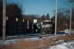 NS 6959 and crew next to the mysterious DOD flatcar